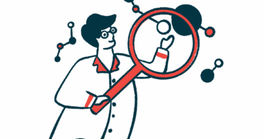 A researcher holds a gigantic magnifying glass in front of one of several floating cells.