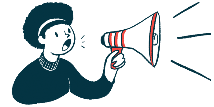 A person uses a megaphone to make an announcement.