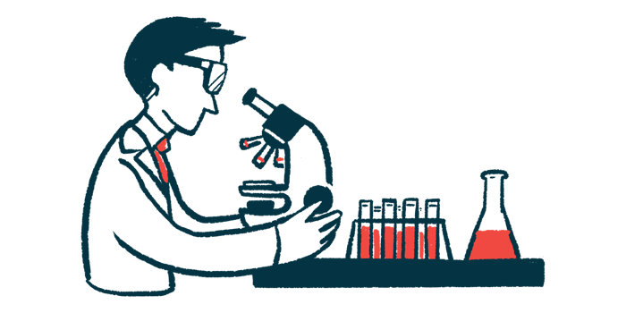 A researcher looks at samples through a microscope.