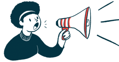 A person uses a megaphone to make an announcement.