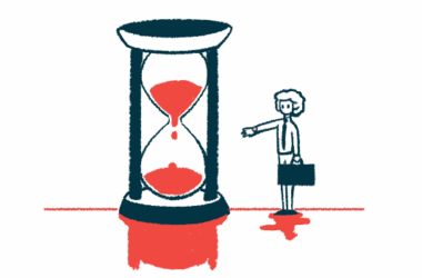 A person carrying a briefcase reaches out a hand toward a giant hourglass nearly half full of sand.
