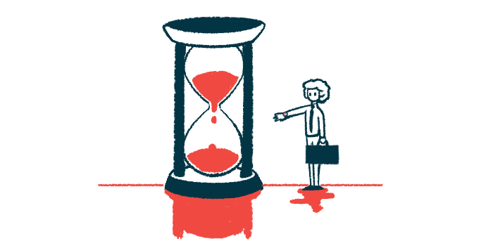 A person carrying a briefcase reaches out a hand toward a giant hourglass nearly half full of sand.