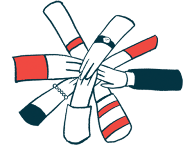 A group of hands joins in a circle.